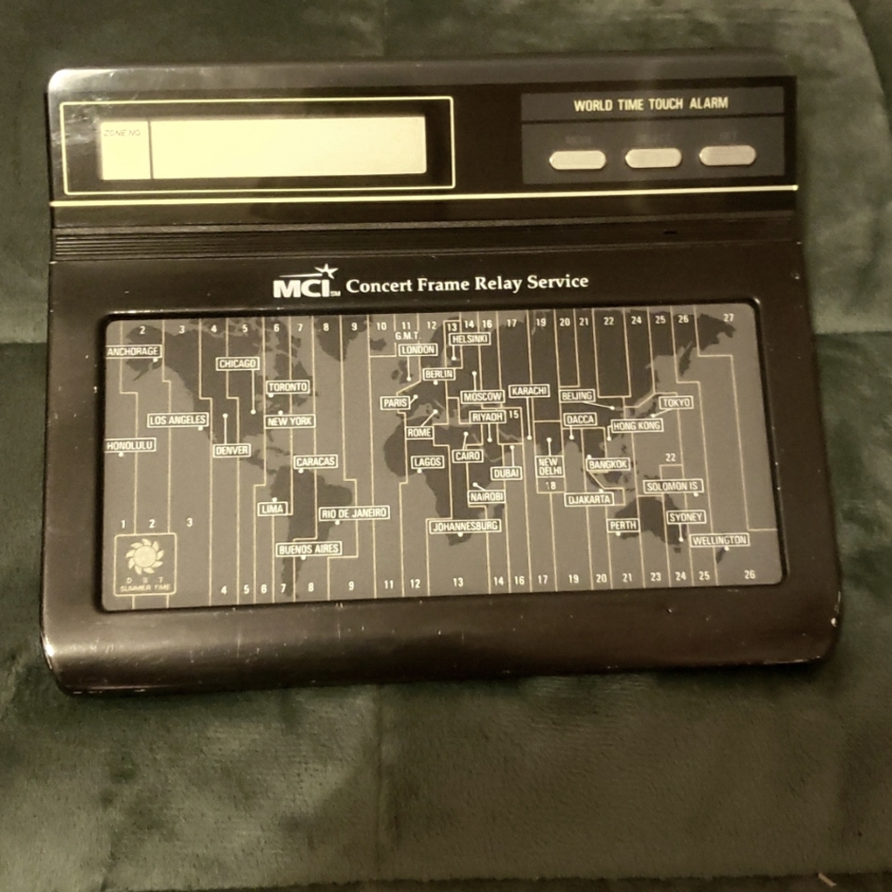 VTG World Time Touch Alarm Clock.  MCI Concert Frame Relay Service